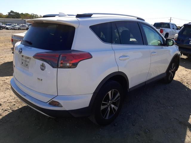 Photo 4 from auction – 2016 TOYOTA RAV4 XLE with VIN 2T3WFREV8GW263473