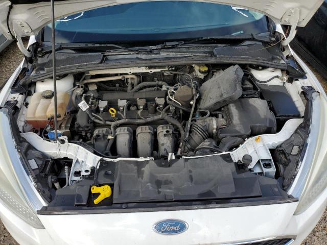 Photo 7 from auction – 2015 FORD FOCUS S with VIN 1FADP3E23FL318037