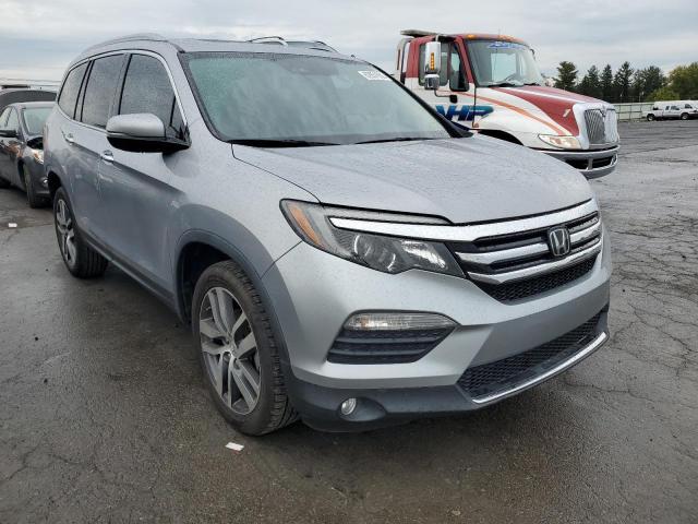 HONDA PILOT ELIT 2017 with VIN 5FNYF6H0XHB082910 - Photo from auction