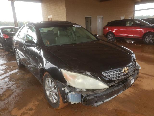 TOYOTA CAMRY LE 2002 with VIN JTDBF30K020034906 - Photo from auction