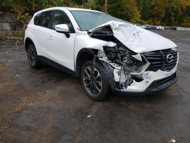 MAZDA CX-5 GT 2016 with VIN JM3KE4DY4G0680231 - Photo from auction