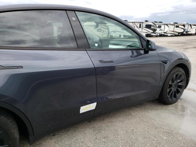 Photo 9 from auction – 2021 TESLA MODEL Y with VIN 5YJYGAEE3MF178923