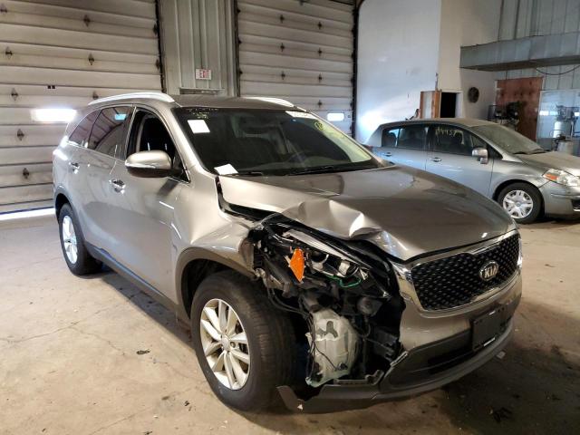 KIA SORENTO LX 2016 with VIN 5XYPG4A54GG178980 - Photo from auction