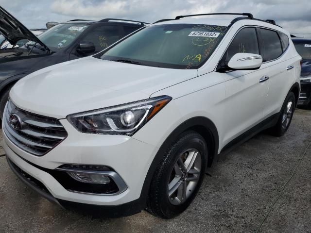Photo 2 from auction – 2018 HYUNDAI SANTA FE S with VIN 5NMZU3LB8JH101458