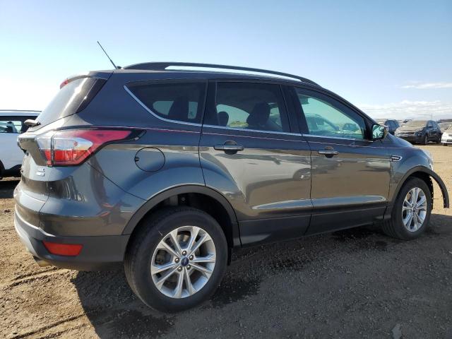 Photo 3 from auction – 2018 FORD ESCAPE SEL with VIN 1FMCU9HD4JUB93210