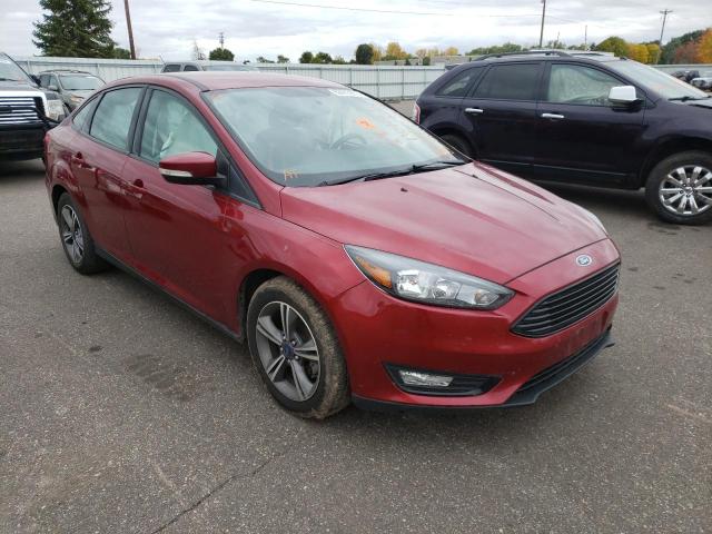 FORD FOCUS SE 2017 with VIN 1FADP3FE9HL323304 - Photo from auction