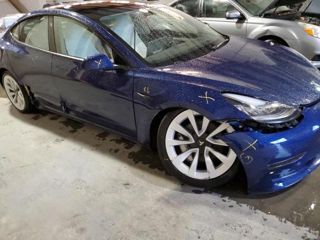 Photo 9 from auction – 2022 TESLA MODEL 3 with VIN 5YJ3E1EB7NF263061