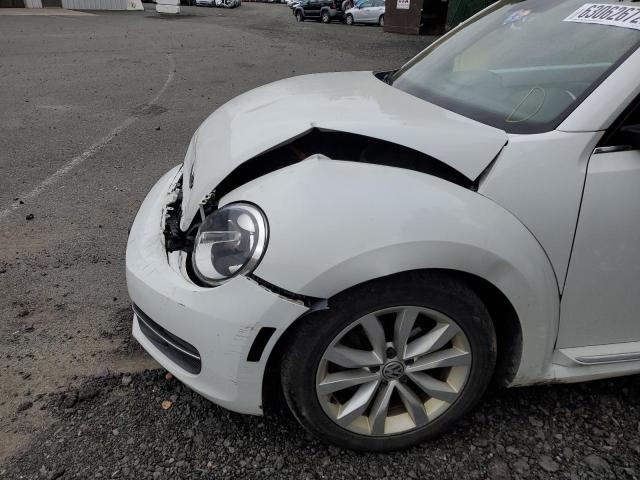 Photo 9 from auction – 2014 VOLKSWAGEN BEETLE with VIN 3VW5L7AT7EM819538