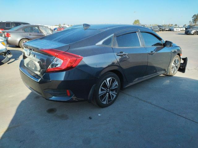 Photo 4 from auction – 2018 HONDA CIVIC EX with VIN JHMFC1F39JX028623