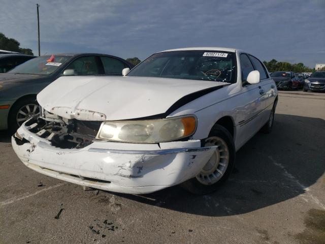 Photo 2 from auction – 2001 LINCOLN TOWN CAR E with VIN 1LNHM81W81Y684254