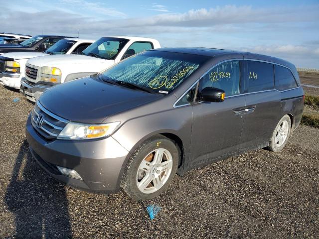 Photo 2 from auction – 2012 HONDA ODYSSEY TO with VIN 5FNRL5H94CB034575