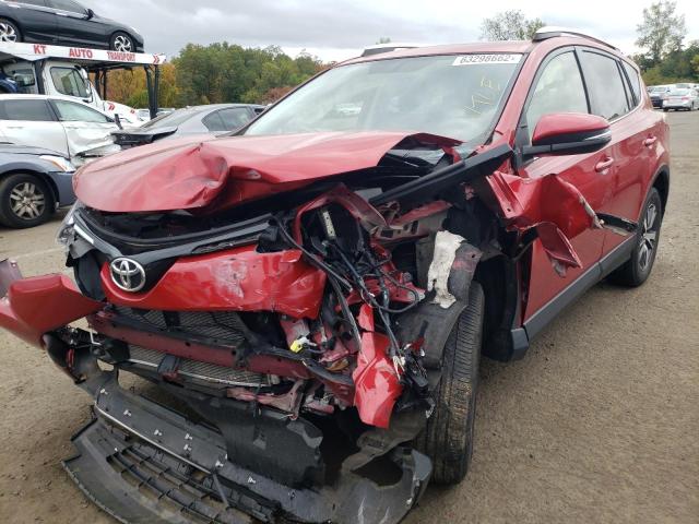 Photo 2 from auction – 2016 TOYOTA RAV4 XLE with VIN JTMRFREV2GJ093963