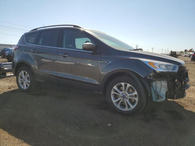 Photo 4 from auction – 2018 FORD ESCAPE SEL with VIN 1FMCU9HD4JUB93210