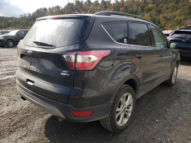Photo 4 from auction – 2018 FORD ESCAPE SE with VIN 1FMCU9GD1JUC61593