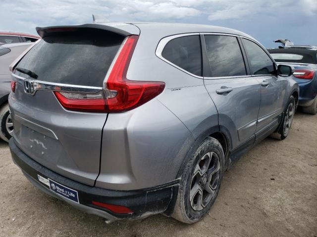 Photo 4 from auction – 2018 HONDA CR-V EX with VIN 7FARW1H53JE010590
