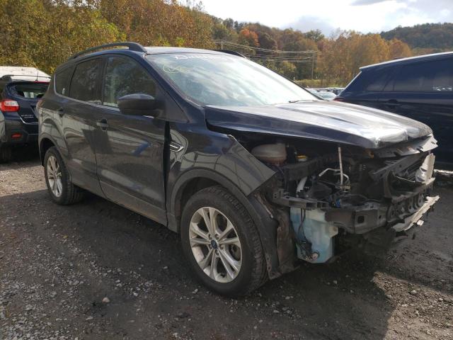 FORD ESCAPE SE 2018 with VIN 1FMCU9GD1JUC61593 - Photo from auction