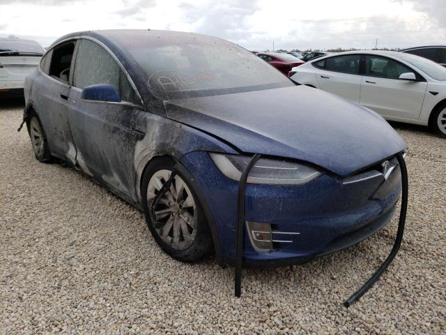 TESLA MODEL X 2020 with VIN 5YJXCDE22LF231320 - Photo from auction