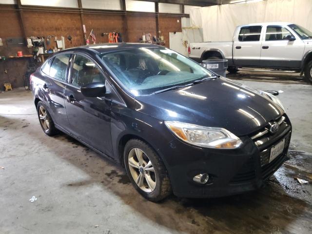 FORD FOCUS SE 2012 with VIN 1FAHP3F20CL385397 - Photo from auction