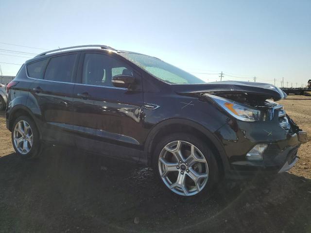 Photo 4 from auction – 2019 FORD ESCAPE TIT with VIN 1FMCU9J90KUA16600