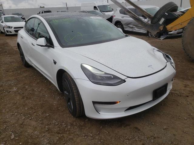 TESLA MODEL 3 2021 with VIN 5YJ3E1EA4MF090668 - Photo from auction