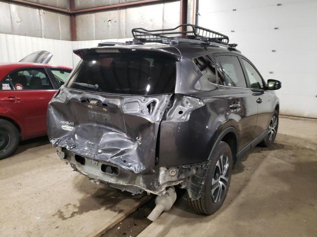 Photo 4 from auction – 2017 TOYOTA RAV4 LE with VIN JTMBFREV8HJ144997