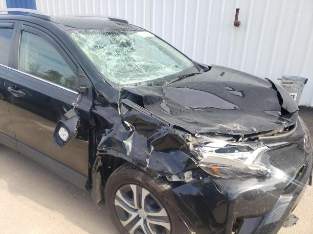 Photo 9 from auction – 2017 TOYOTA RAV4 LE with VIN 2T3BFREV9HW658942