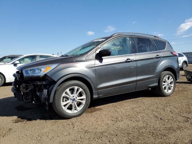FORD ESCAPE SEL 2018 with VIN 1FMCU9HD4JUB93210 - Photo from auction