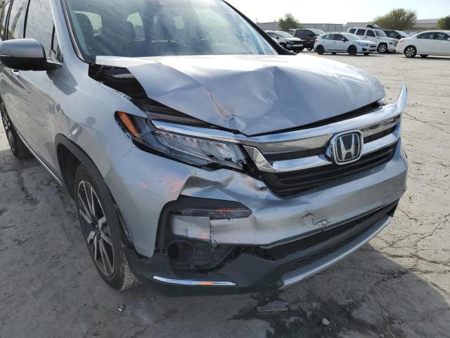 Photo 9 from auction – 2021 HONDA PILOT ELIT with VIN 5FNYF6H08MB016270