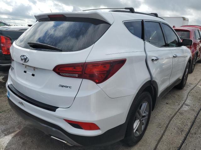 Photo 4 from auction – 2018 HYUNDAI SANTA FE S with VIN 5NMZU3LB8JH101458