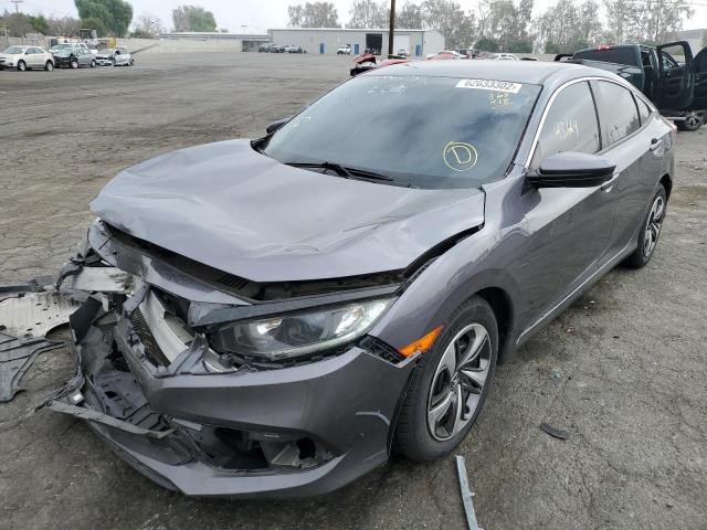 Photo 2 from auction – 2019 HONDA CIVIC LX with VIN 19XFC2F60KE200332