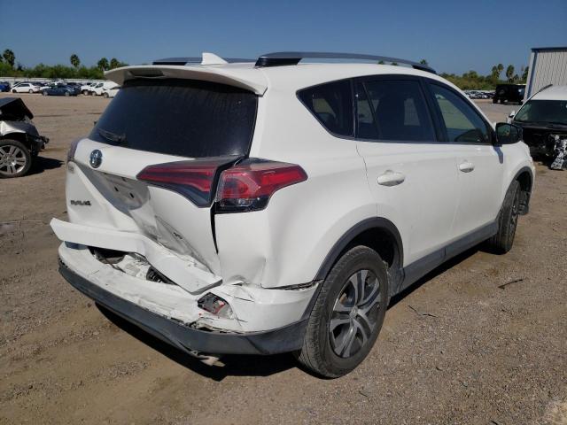 Photo 4 from auction – 2018 TOYOTA RAV4 LE with VIN JTMZFREVXJD129369