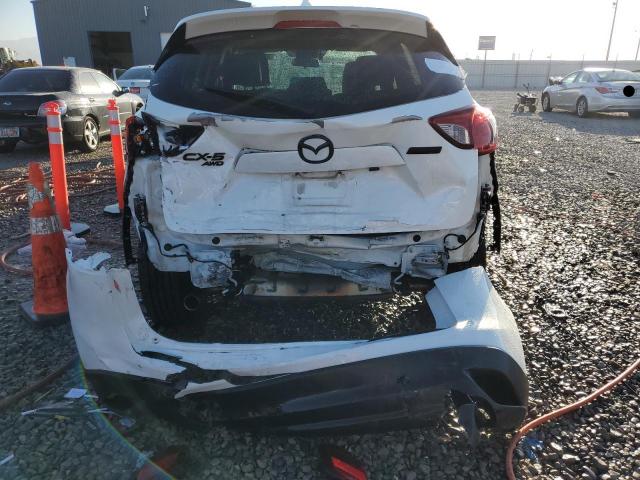 Photo 9 from auction – 2015 MAZDA CX-5 GT with VIN JM3KE4DYXF0441684