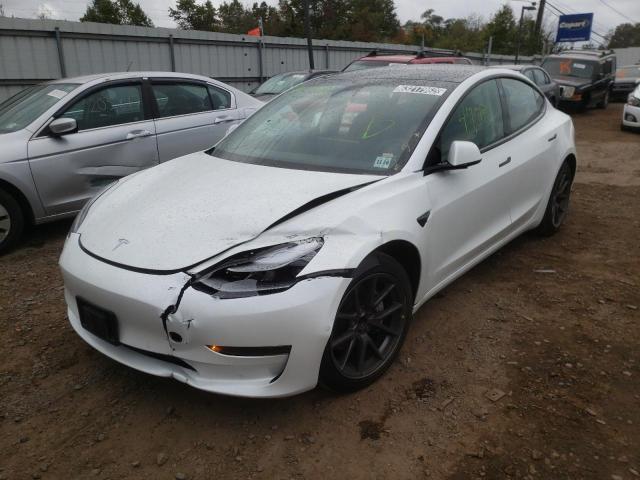 Photo 2 from auction – 2021 TESLA MODEL 3 with VIN 5YJ3E1EA4MF090668