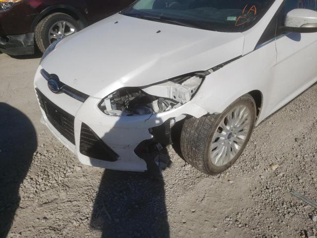 Photo 9 from auction – 2012 FORD FOCUS TITA with VIN 1FAHP3N25CL319221