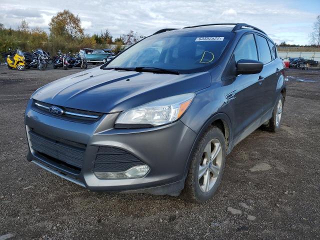 Photo 2 from auction – 2014 FORD ESCAPE SE with VIN 1FMCU9G92EUA03813