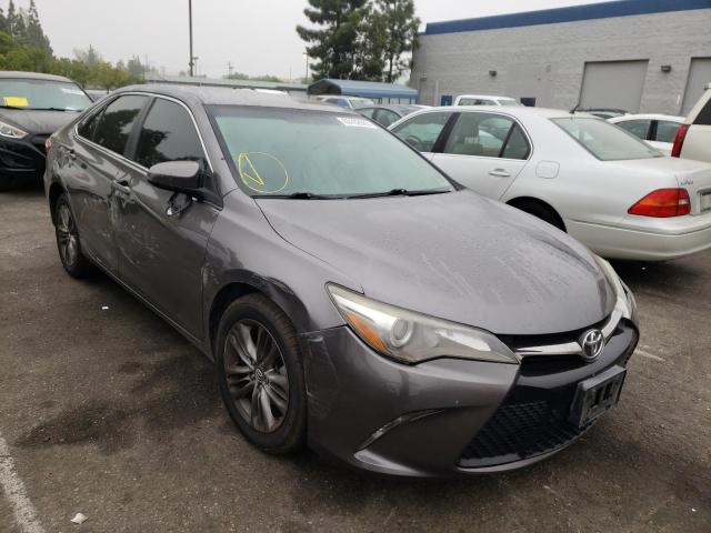 TOYOTA CAMRY LE 2015 with VIN 4T1BF1FK5FU974169 - Photo from auction