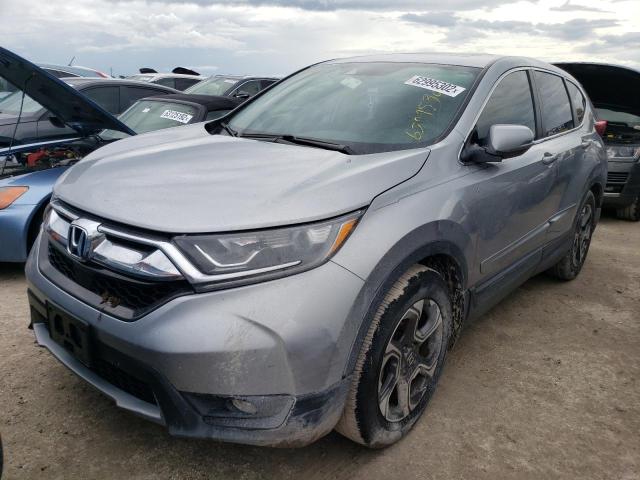 Photo 2 from auction – 2018 HONDA CR-V EX with VIN 7FARW1H53JE010590