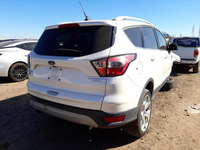 Photo 4 from auction – 2018 FORD ESCAPE TIT with VIN 1FMCU0J96JUC09456