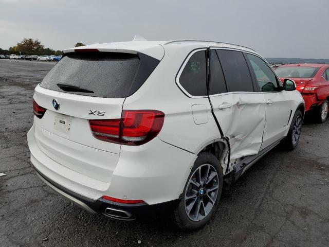 Photo 4 from auction – 2018 BMW X5 XDRIVE3 with VIN 5UXKR0C5XJ0X96990