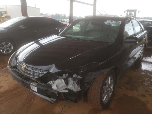 Photo 2 from auction – 2002 TOYOTA CAMRY LE with VIN JTDBF30K020034906