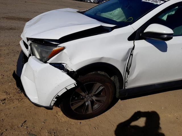 Photo 9 from auction – 2016 TOYOTA RAV4 XLE with VIN 2T3WFREV8GW263473