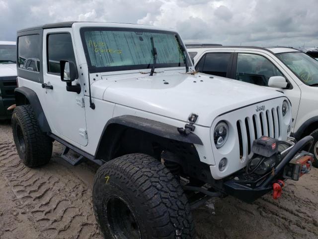 JEEP WRANGLER S 2015 with VIN 1C4AJWAG8FL736059 - Photo from auction