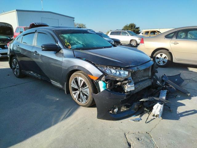 HONDA CIVIC EX 2018 with VIN JHMFC1F39JX028623 - Photo from auction