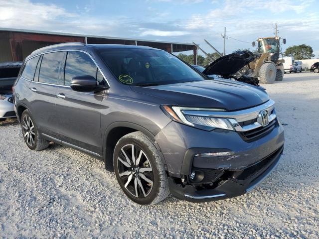 Photo 1 from auction – 2020 HONDA PILOT TOUR with VIN 5FNYF5H97LB018843
