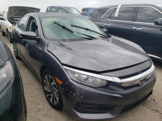 HONDA CIVIC EX 2017 with VIN 19XFC2F70HE051115 - Photo from auction
