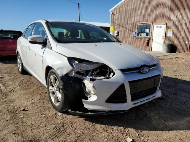 FORD FOCUS SE 2014 with VIN 1FADP3F20EL178946 - Photo from auction