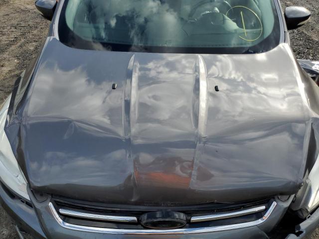 Photo 7 from auction – 2014 FORD ESCAPE TIT with VIN 1FMCU0J98EUA36772