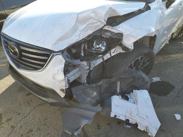 Photo 9 from auction – 2016 MAZDA CX-5 GT with VIN JM3KE2DY8G0849736