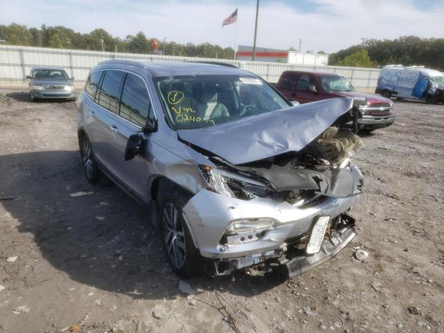 HONDA PILOT TOUR 2017 with VIN 5FNYF5H95HB024079 - Photo from auction