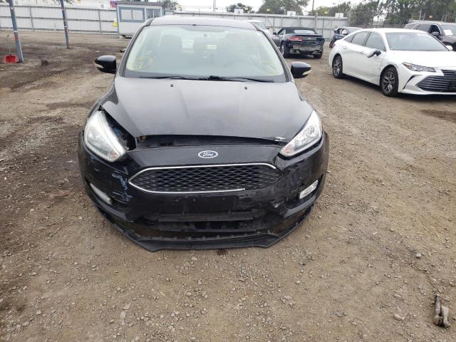 Photo 9 from auction – 2015 FORD FOCUS SE with VIN 1FADP3F24FL221637